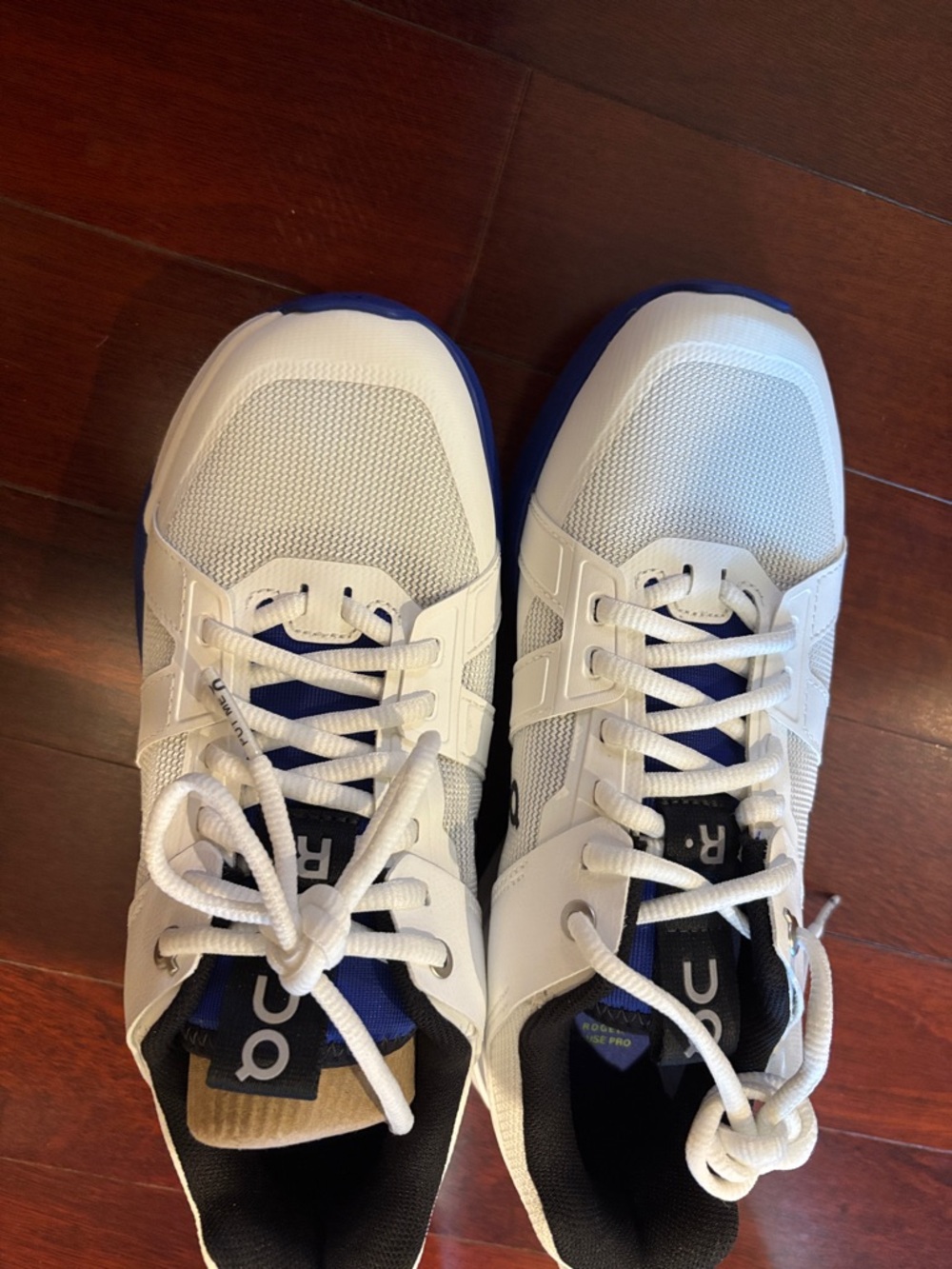 On Running women,s White Athletic Shoes with Blue Accents - Picture 4 of 5